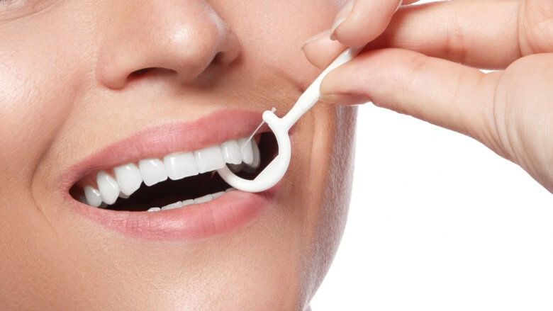 نخ دندان در زمان ارتودنسی